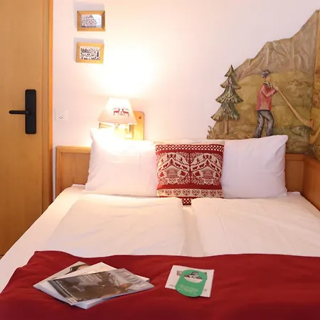 Grichting & Serviced Hotel